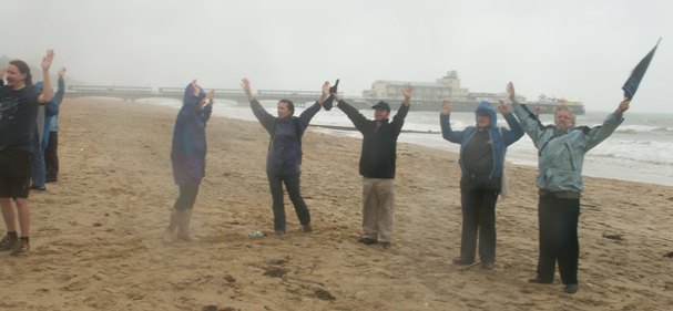 350 hands by Bournemouth pier Blustery Climate Change message for Copenhagen